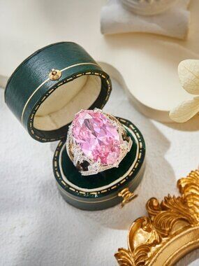 Elaborate Oval-Cut Pink Diamond-Style Ring